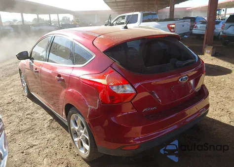 2014 Ford Focus Titanium from USA, damaged, VIN 1FADP3N20EL463437